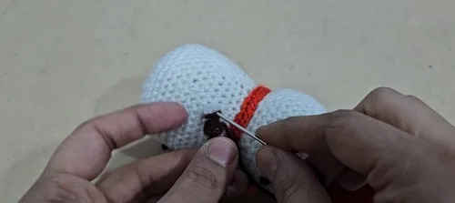 Crochet snowman ornament pattern for a festive touch — photo 3