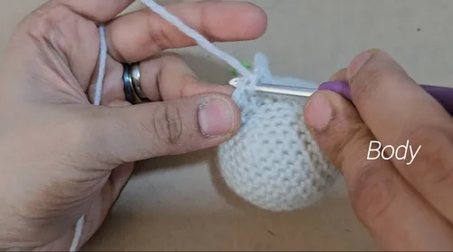Crochet snowman ornament pattern for a festive touch — photo 4