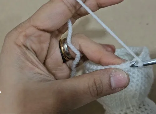 Crochet snowman ornament pattern for a festive touch — photo 5