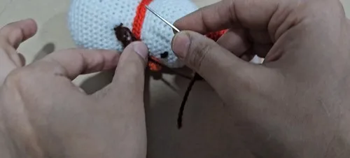 Crochet snowman ornament pattern for a festive touch — photo 6