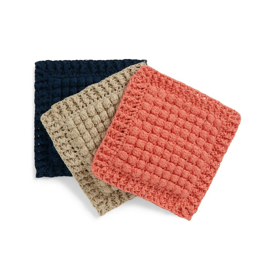 Textured bobble hot pads in warm autumn hues