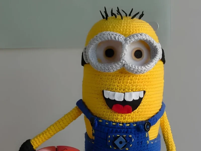 Crochet minion amigurumi with overalls and tiny hands
